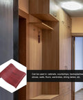 Brown Peel And Stick Wallpaper Featuring Ridiculously Durable Waterproof Vinyl With Zero Mess Application Breezy Removal Wood Grain Texture applied in a modern hallway with cabinets.