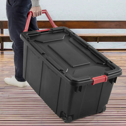 Person pulling Beefy 40 Gallon Plastic Storage Bins 2 Pack With Durable Lids And Secure Latching Buckles on wheels