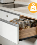 Lock In That Smooth Storage With Twelve Inch Bottom Mount Drawer Slides Heavy Duty Metal Sliding Rail Pair For Quiet Gliding Operation And Pro Level Install with open drawer holding jars.