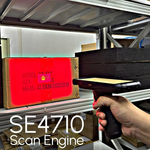 Workhorse Android Barcode Scanner With Pistol Grip Equipped With SE4710 Engine scanning a box on a shelf