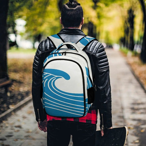 Unisex Minimal Wave Art Backpack In Cobalt Blue on person walking through park, large capacity daypack with art print, sturdy build