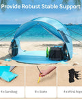 Pop Up Beach Tent Sun Shelter With UPF50+ UV Protection, Instant Easy Setup, 3 Person Capacity, Blue tent on beach with accessories
