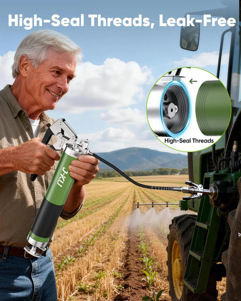 J-KU grease gun, green metal body with black grip and flexible hose used on a tractor.