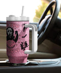 Totally Sick Halloween Scary Mask Tumbler With Lid And Straw 40 Oz Insulated Travel Cup in car cup holder.