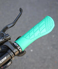 Close-up of Grippy Ergonomic Bike Grips For BMX And Scooters, Non Slip Comfort Handlebar Grips With Soft Rubber, in cyan