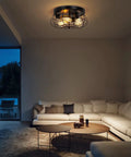 Dope Farmhouse Flush Mount Ceiling Light With Industrial Metal Cage Shade, lighting up a living room setting with modern rustic decor.