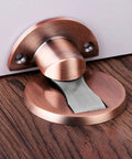 Stunning Red Bronze Hidden Magnetic Door Stop That Keeps Floors Clean And Slams At Bay For Homes, Hotels, And Offices With Nail-Free Installation, close-up angle.