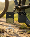 Road Bike Disc Brake Pads Kit With Spring And Pin For Consistent Stopping On Road Rides Resin And Metal Construction With Stainless Steel Support Durable Spares For Daily Rides And Routine Maintenance. resin-metal brake pads with pin and spring, front view