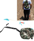 Backpack Style Fertilizer Spreader For Lawn And Garden Manual Handheld Broadcast Spreader with adjustable straps on person in field