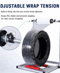 Hella Adjustable Tire Wrap Dispenser Stand For Car And Truck Wheels With Dual Roller Base Smooth Rotating Platform Auto Shop Stretch Film Holder showcasing adjustable wrap tension mechanism.