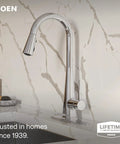 Moen Swyre Pulldown Kitchen Faucet, Chrome, 87508 with sleek design and pull-down spray, displayed in a modern kitchen.