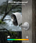 Outdoor Wireless Security Camera System With Spotlight And Siren mounted on wall in rain, featuring IP65 weatherproof design