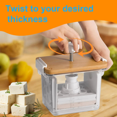 Hand twisting knob on dishwasher safe press for quick no fuss meal prep and extra firm tofu, openable U drip tray visible