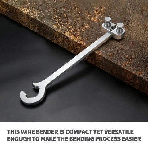 Pro 500 MCM Cable Bender Tool with Ratchet Adapter on a work surface, showcasing its compact design for tough wire bending.