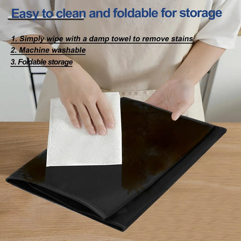 Person wiping Heavy Duty Waterproof Dust Cover For Single Serve Coffee Makers That Keeps Your K Cup Pod Machine Covered From Dust And Spills, black