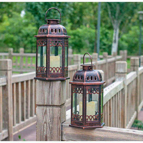 Two Pack Bronze Solar Lanterns With Ornate Retro Hanging Design on wooden railing, outdoor LED flickering candle lights, 6.6x6.6x10.6 inches