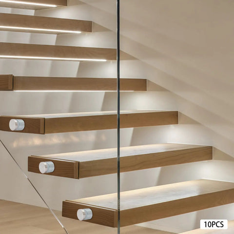 10 Pack 304 Stainless Steel Glass Railing Standoffs With Slick Wire Draw Texture, installed on modern wood stairs.