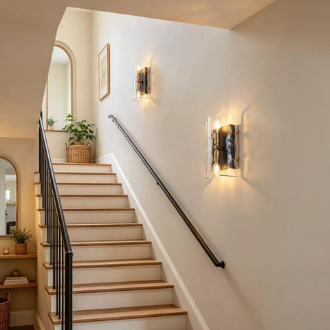 MWZ Modern 2-Light Wall Sconce Set of 2 with Water Rippled Glass Shades 11" mounted on a staircase wall in a hallway.
