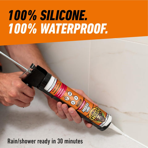 Applying 100 Percent Waterproof Silicone Caulk For Kitchen And Bath Sealant Mold Resistant White 10 Oz Cartridge to shower tiles.