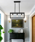 Interior with Black Industrial Kitchen Island Light With 3 Light Linear Cage Chandelier above table and decor.