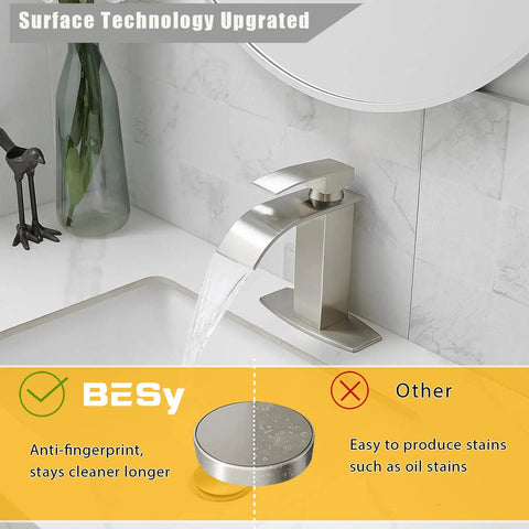 Waterfall Bathroom Faucet With Single Handle Vanity Sink Spout RV Ready Deck Plate For 1 Or 3 Hole Install Brushed Nickel Stainless Steel Pop Up Drain Included Flexible Hoses Easy Install shown with water flowing into sink.