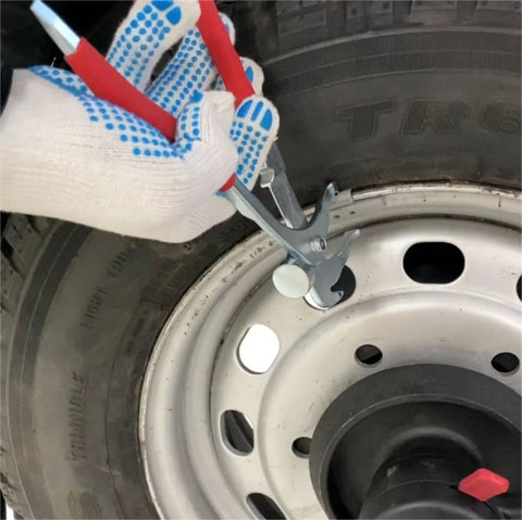 Heavy Duty Wheel Weight Pliers And Tire Balancing Tool For Cars, SUVs And Trucks Clip On Weight Remover And Installer With Hammer Function Textured Rubber Handle Alloy Construction 12 Oz Weight in use on car wheel