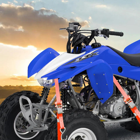 Heavy Duty Ratchet Tie Down Straps Set securing a blue ATV, 1500 Lb Break Strength, 1 Inch By 15 Foot, in sunset background.
