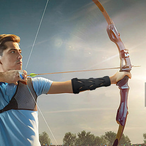 Archer wearing Adjustable Archery Arm Guard Bracer For Unisex Archers Lightweight Forearm Protector during target practice.