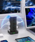 17 In 1 Power Strip Tower With Wireless Charger, Flat Plug Surge Protector, 10ft Extension Cord, 12 AC Outlets And 4 USB Ports (2 USB-C, 2 USB-A), 15W Wireless Charging For Home Office Dorm, Black on desk beside laptop
