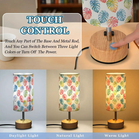 Watercolor Monstera Leaf Palm Decor Bedside Lamp with dimmable touch control and charging station displayed with light settings.