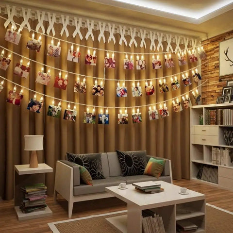40 LED Photo Clip String Lights With Remote USB Powered 25.75 Ft Long 8 Modes displaying photos in cozy living room