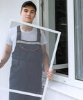 Person holding screen door used with Three In One Screen Repair Kit With Nylon Roller, Steel Roller And Removal Hook For Installing Window