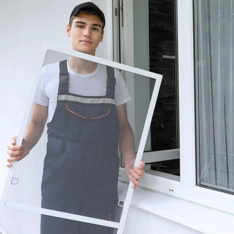 Person holding screen door used with Three In One Screen Repair Kit With Nylon Roller, Steel Roller And Removal Hook For Installing Window