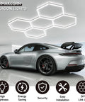 Hexagon LED Garage Lights 6500K Cool White Hex Ceiling Fixture illuminating garage scene with sports car and feature icons.
