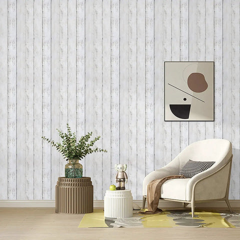 Living room with Shiplap Peel And Stick Wallpaper White Wood Plank Vinyl Wrap for walls, featuring modern decor and armchair.