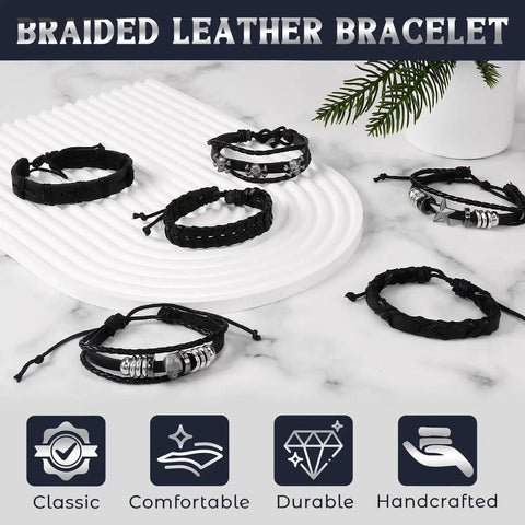 Badass Punk Leather Bracelet Set With Studded Spike Cuffs And Skull Details Kicking Up That Dope 80s Rock Vibe Premium Faux Leather Goth Accessories For Men Women Ready To Rock Out Today. Six black braided faux leather bracelets with silver accents laid on a white plate.