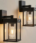 Kickass Solar Wall Lanterns With Hella Bright Motion Sensor And Three Flexible Lighting Modes For Outdoor Patio Runs Wirelessly Plus Storm Ready Build In A Quick Install Two Pack Set mounted on a wall.
