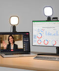 Ring Light For Laptop And Desk Setup With Screen Safe Clip And Adjustable Monitor Mount Eye Caring Diffused LED For Natural Skin Tones CRI 97.8 50 Lighting Modes For Zoom Calls Video Streaming And On Camera Meetings installed on a desk with laptop and monitor.