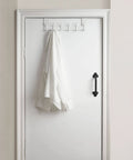 Over The Door Hooks White 6 Pack Towel Rack And Coat Hanger For Back Of Door Organization Fits Doors From One And Three Eighths To One And Three Quarters Inches Thick With Soft Sponge Padding To Prevent Scratches shown installed with a shirt hanging