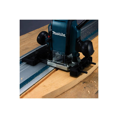 Rig Ready Router Guide Rail Adapter With Legit Smooth Routing And Hella Precise Dado Mortise Trimming Capability Quick No Sweat Setup For Compatible Power Tool Rigs used with Makita router on wood.