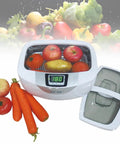 Front view of an Industrial Grade Ultrasonic Cleaner With Heater And 2.5L Capacity, Digital Display, used for cleaning fruits and vegetables.