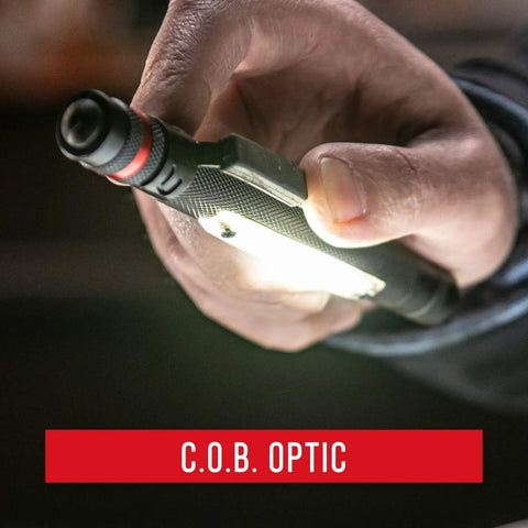 Pocket Sized Magnetic LED Penlight With Dual Power Alkaline Battery And COB Area Light held in hand showing C.O.B. optic.
