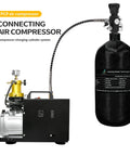 4500 Psi 2.7L Carbon Fiber Scuba Tank with Paintball Fill Station Valve connected to air compressor