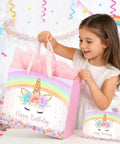 Girl with 13 Inch Unicorn Gift Bag With Greeting Card And Tissue Paper For Baby Girls And Kids Birthday Party Rainbow Unicorn Theme All In One Gift Bag Set