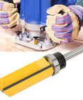 Heavy Duty Four Inch Shank T Shaped Router Bit For Woodworking Milling cutting slotting trimming used by carpenter with gloves on.