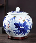 Heavy Duty Ceramic Airtight Rice Bin And Cereal Canister With Retro Chinese Motifs on wooden base, floral design, ideal for kitchen storage.