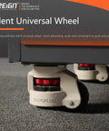 Close-up of silent universal wheel on heavy duty mobile tool storage organizer with light strip CNC tool rack and screw cabinet.
