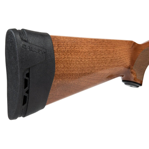 Recoil Eraser II Slip-On Pad for Medium Firearms on a wooden rifle stock, comfortable black cushion for rifles and semi-auto shotguns.
