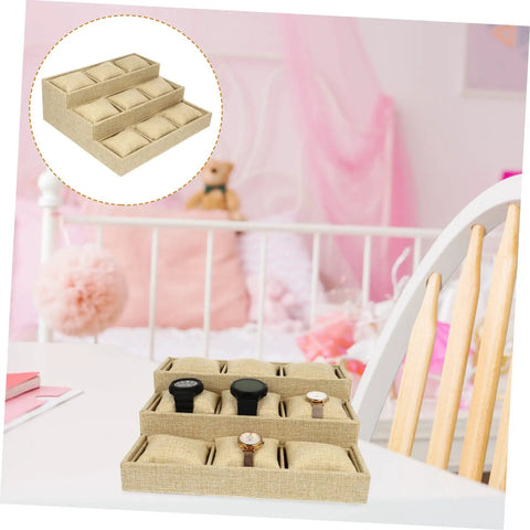 Multi Grid Watch Organizer Tray With Linen Padded Sections perfect jewelry display stand for rings and bracelets on a table.