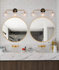 Black And Gold Three Light Vanity Light Fixture With Seeded Glass Shades And Black Backplate For Modern Bathrooms Over Vanity Mirror
